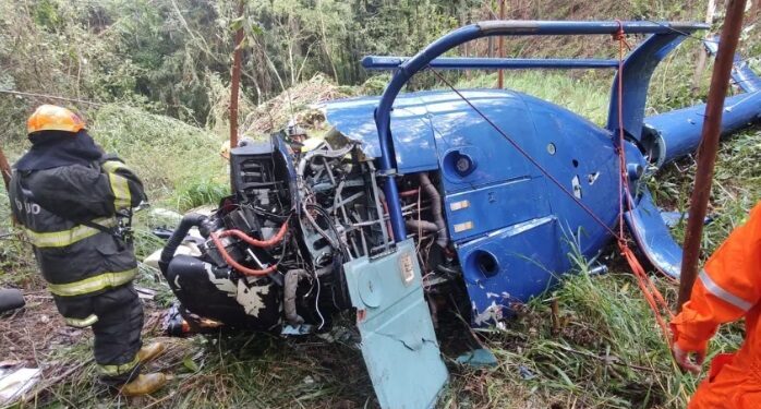 Piloto e criança são resgatados de queda de helicóptero em SP; dois morrem